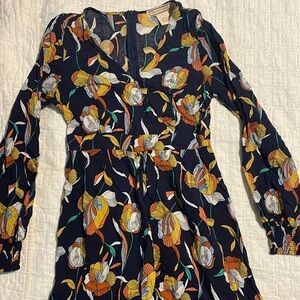 Beautiful long sleeve dress with high-low detail on bottom.